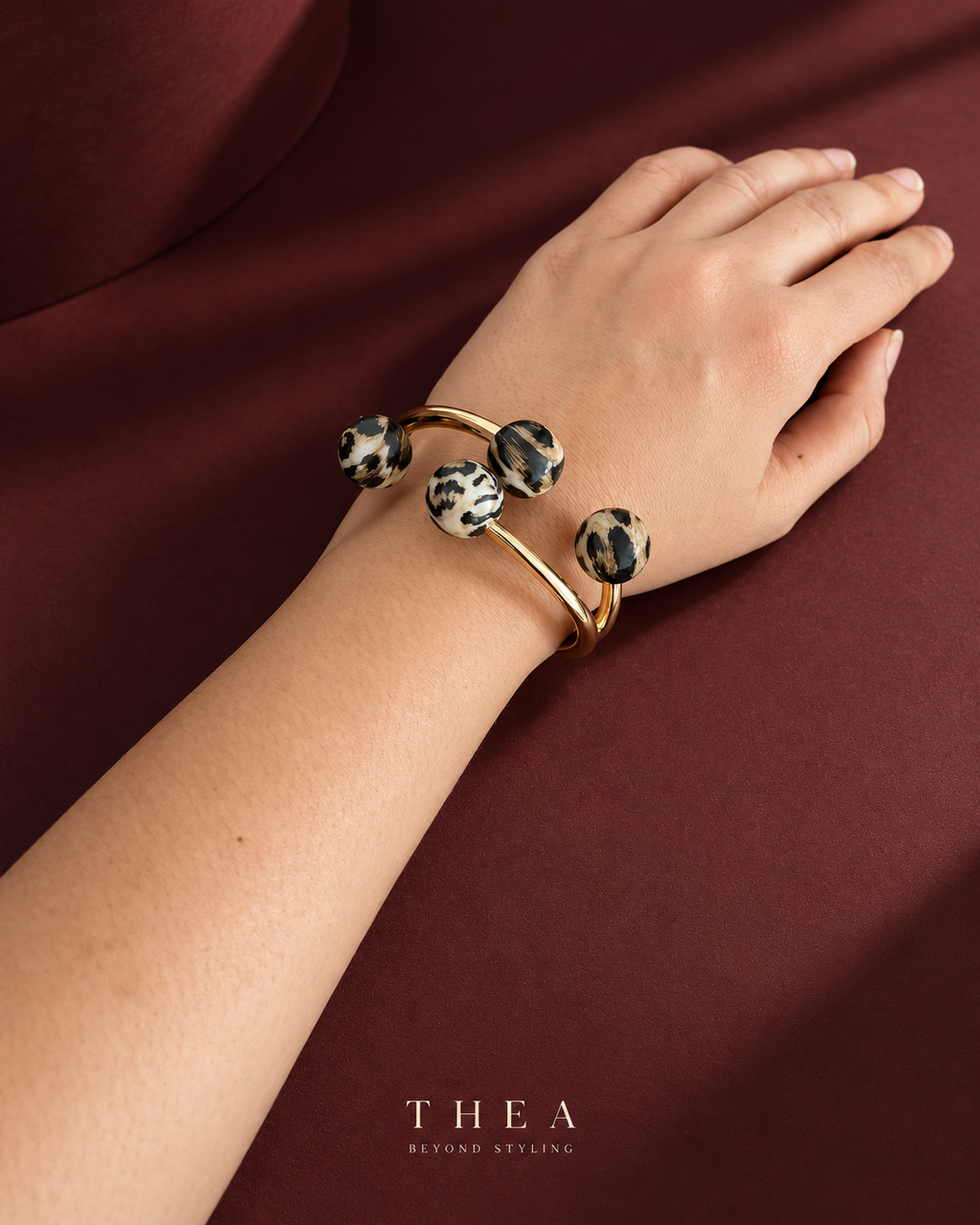 Cheetah Print Orbit Cuff on display stand