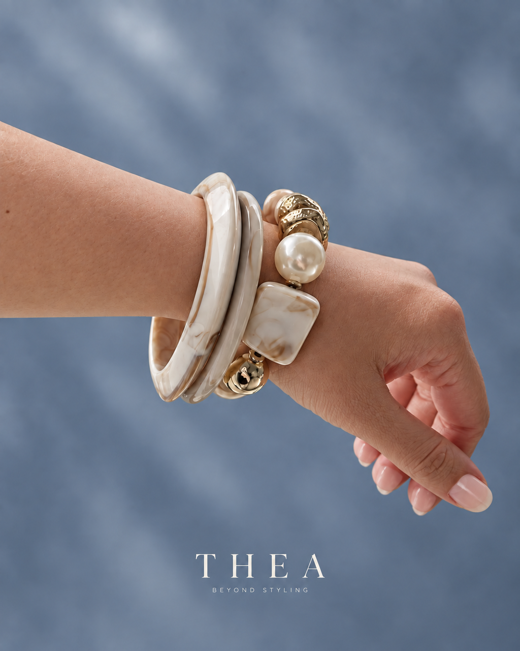 Ivory Muse Stack bangles and beaded bracelet worn on wrist