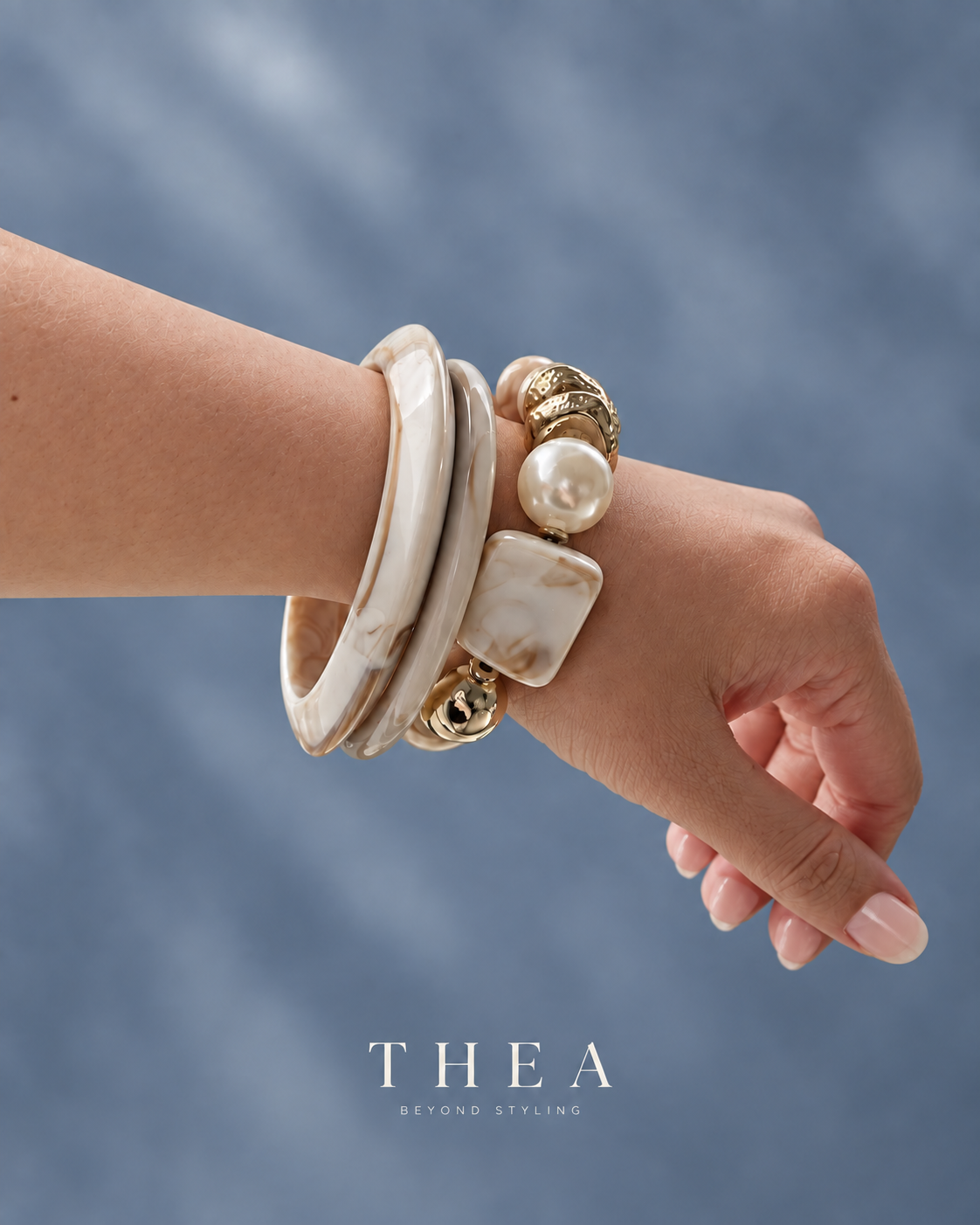 Ivory Muse Stack bangles and beaded bracelet worn on wrist