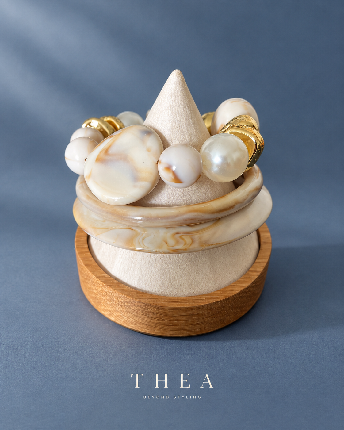 Ivory Muse Stack on display stand