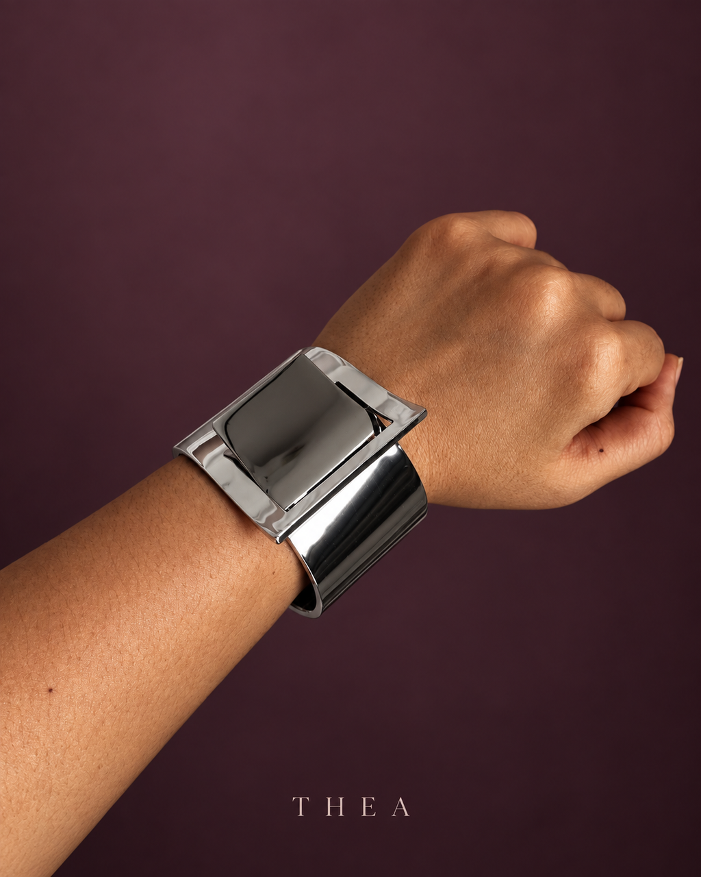 Mirror Frame Cuff in polished silver tone worn on wrist