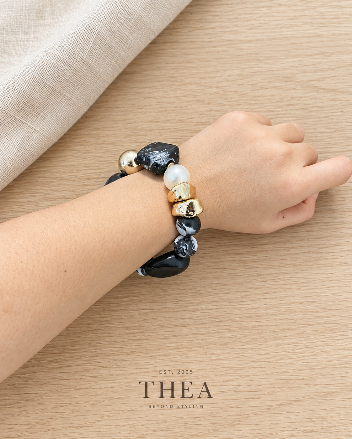Noir Mosaic Bracelet with black, charcoal marbled, pearl-look and gold-tone beads