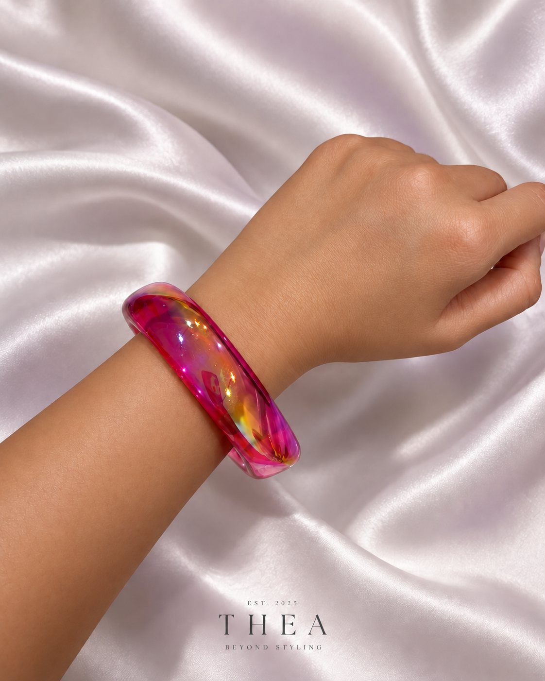 Prism Sculpt Bangle in translucent fuchsia