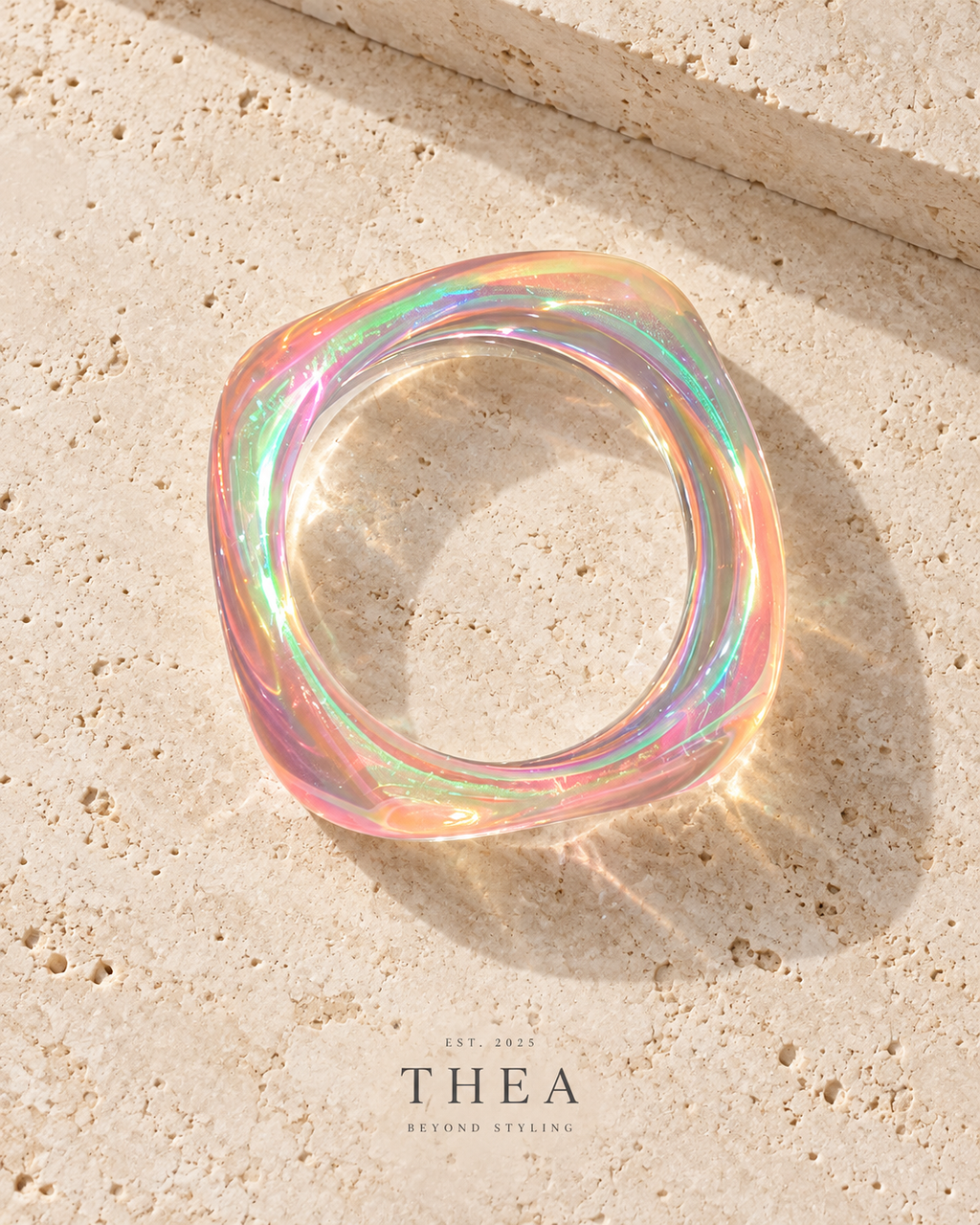 Prism Sculpt Bangle in opal with rainbow reflections