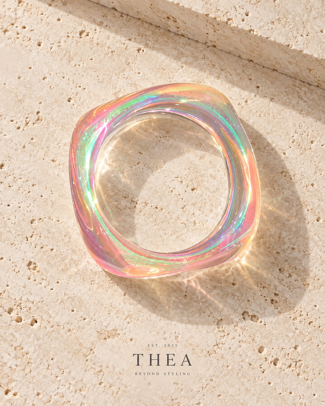 Prism Sculpt Bangle in opal with rainbow reflections