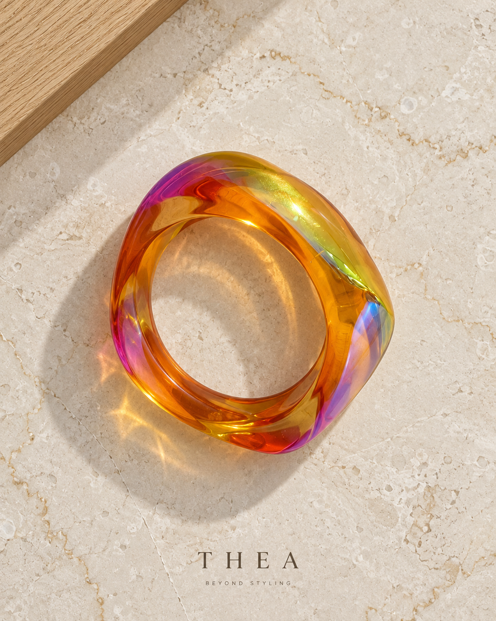 Prism Sculpt Bangle in iridescent amber orange