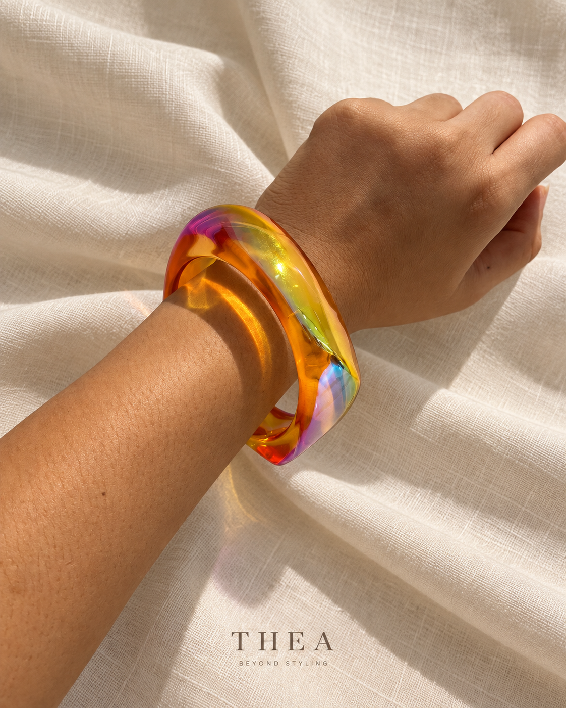 Prism Sculpt Bangle in iridescent amber orange