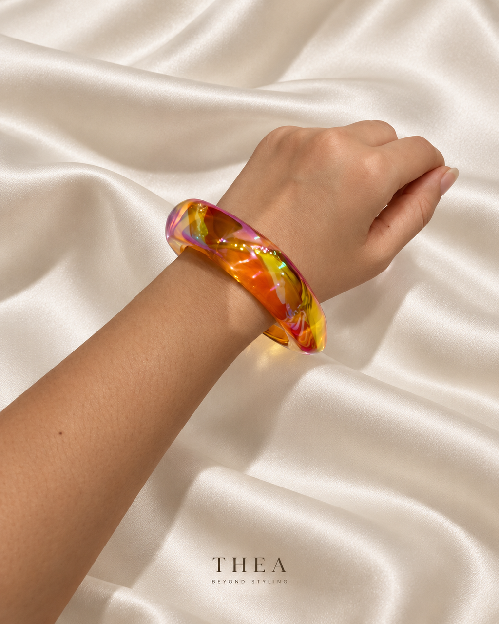 Prism Sculpt Bangle in iridescent amber orange