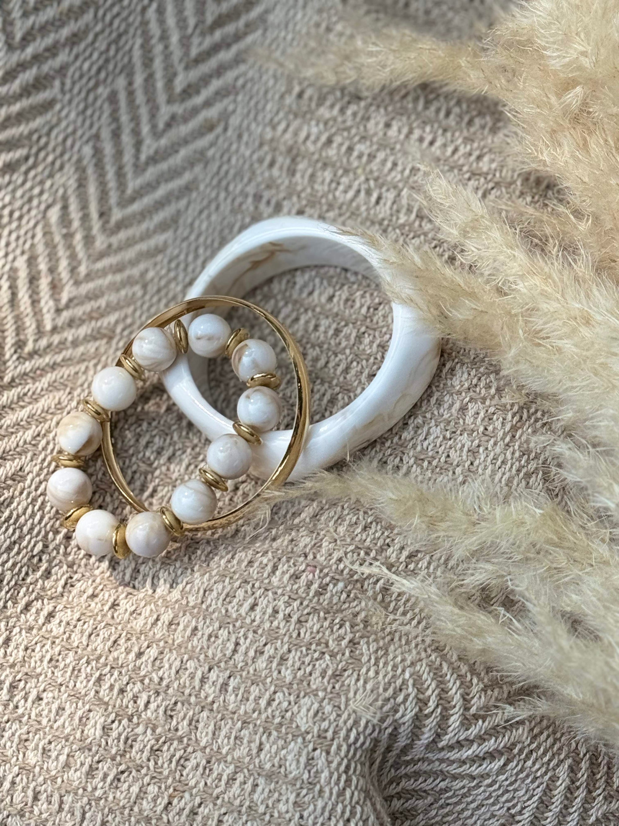 IVORY GLOW STATEMENT BRACELET