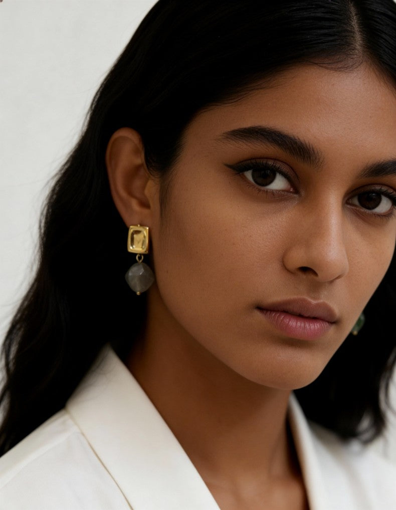 Model wearing green marbled Stone Drop Earrings with gold-toned square studs