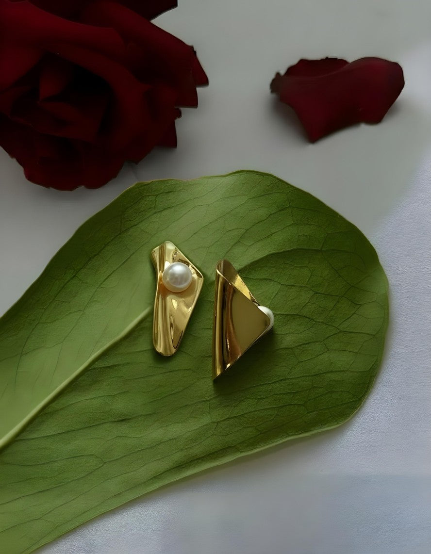 Gold sculptural folded earrings with pearl accents