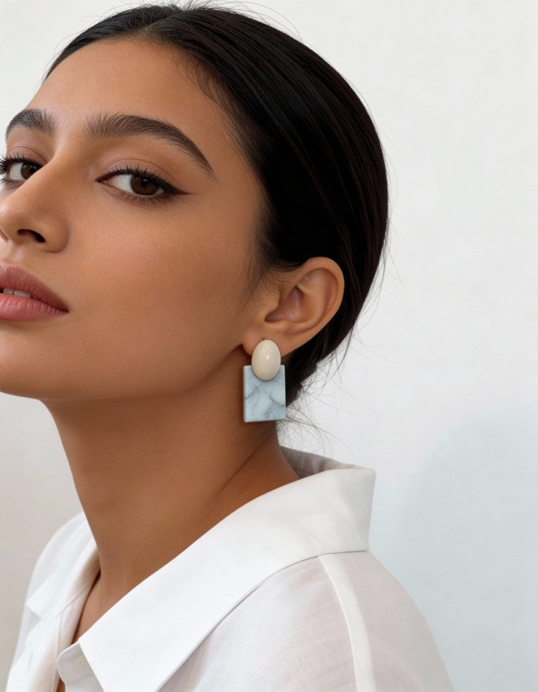 Model wearing yellow marble-inspired Palette Block Earrings